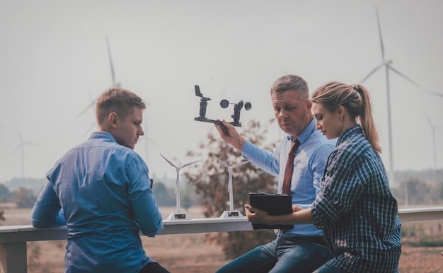 Engineers reviewing schematics for a new wind turbine project, demonstrating the technical expertise and planning involved in renewable energy investments.