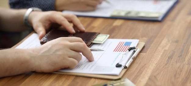 A legal professional pointing to different sections of the U.S. Visa Bulletin, emphasizing the concept of 'current priority dates' and 'backlogs'.