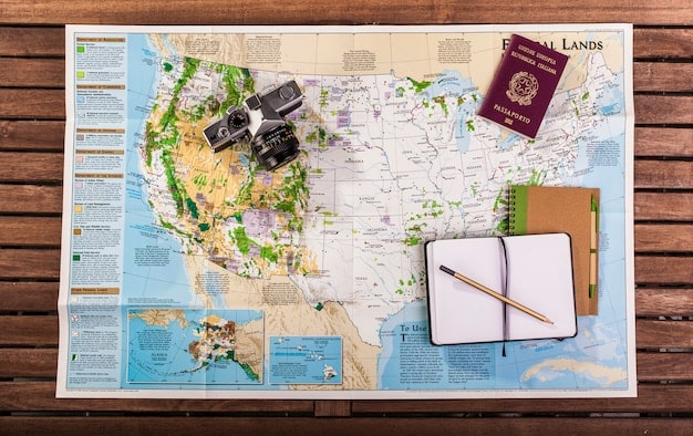 A detailed shot of paperwork and official stamps on a desk, with a blurred map of the US and Mexico in the background, symbolizing the bureaucratic process and cross-border nature of the H-2A visa.