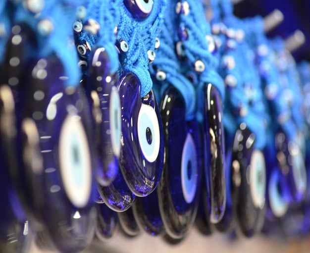 A close-up of automotive robots assembling parts in a highly automated factory, symbolizing efficiency and technological investment.